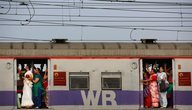 In this April 7, 2014 photo, Indian women travel in the ladies compartment of a local train in Mumbai, India. Women form more than 49 percent of India's 814 million voters, but many of them, especially in rural India, feel their concerns are not taken seriously by political parties, and that they take a back seat to men in everything from health care to education to legal protection. (AP Photo/Rafiq Maqbool)