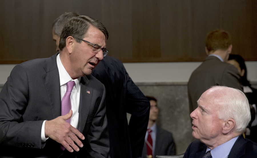 Carter defends recruitment program from McCain attacks