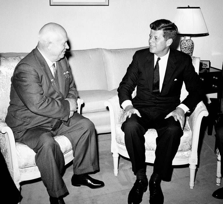FILE - In this June 3, 1961, file photo, Soviet Premier Nikita Khrushchev and President John F. Kennedy talk in the residence of the U.S. Ambassador in a suburb of Vienna. The meeting was part of  a series of talks during their summit meetings in Vienna. Fifty years after the Cuban missile crisis, the National Archives in Washington has pulled together documents and secret White House recordings to show the public how President John F. Kennedy deliberated to avert nuclear war. The exhibit recounts the showdown with the Soviet Union. It is called 