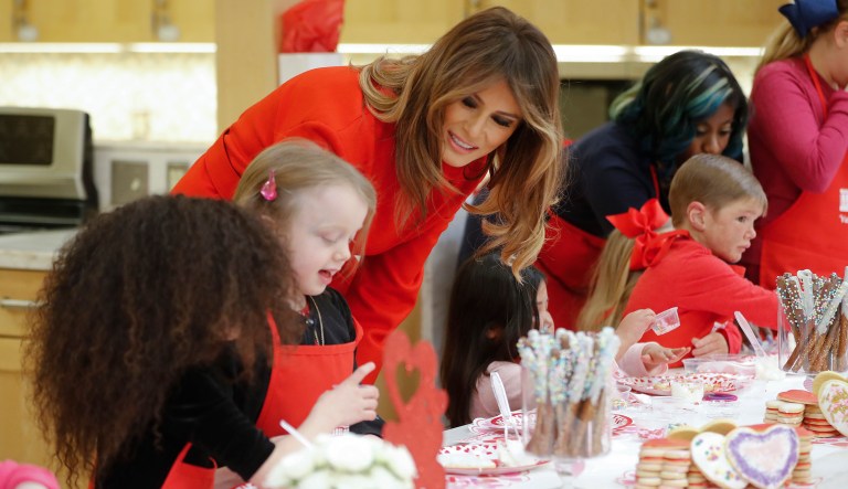 First lady Melania Trump meets with children making cookies for Valentine's Day during her visit to the Children's Inn at the National Institute of Health in Bethesda, Md. (AP Photo/Pablo Martinez Monsivais)