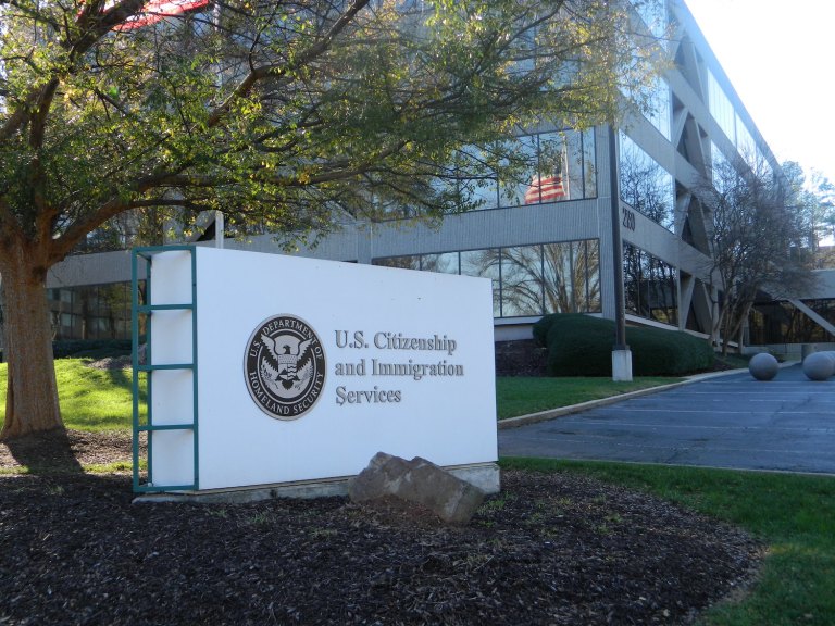 USCIS said the new green cards would display a person's picture on both sides of the card, and show an image of the Statue of Liberty. (Wikipedia Commons)