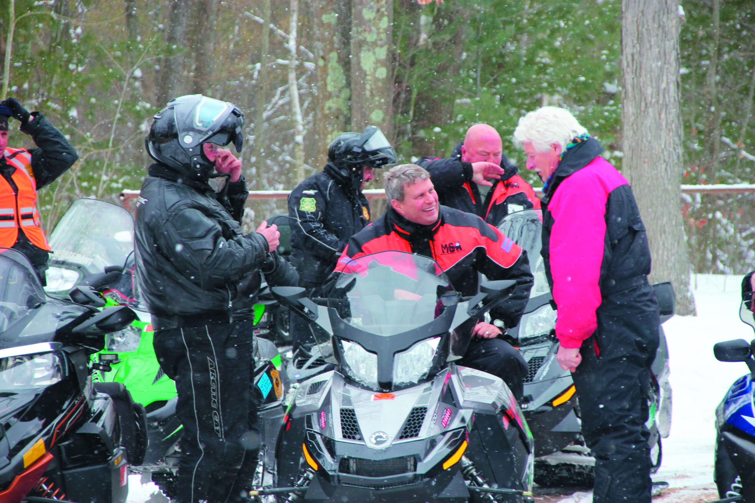 Michigan’s Huizenga hits the trail — on a snowmobile