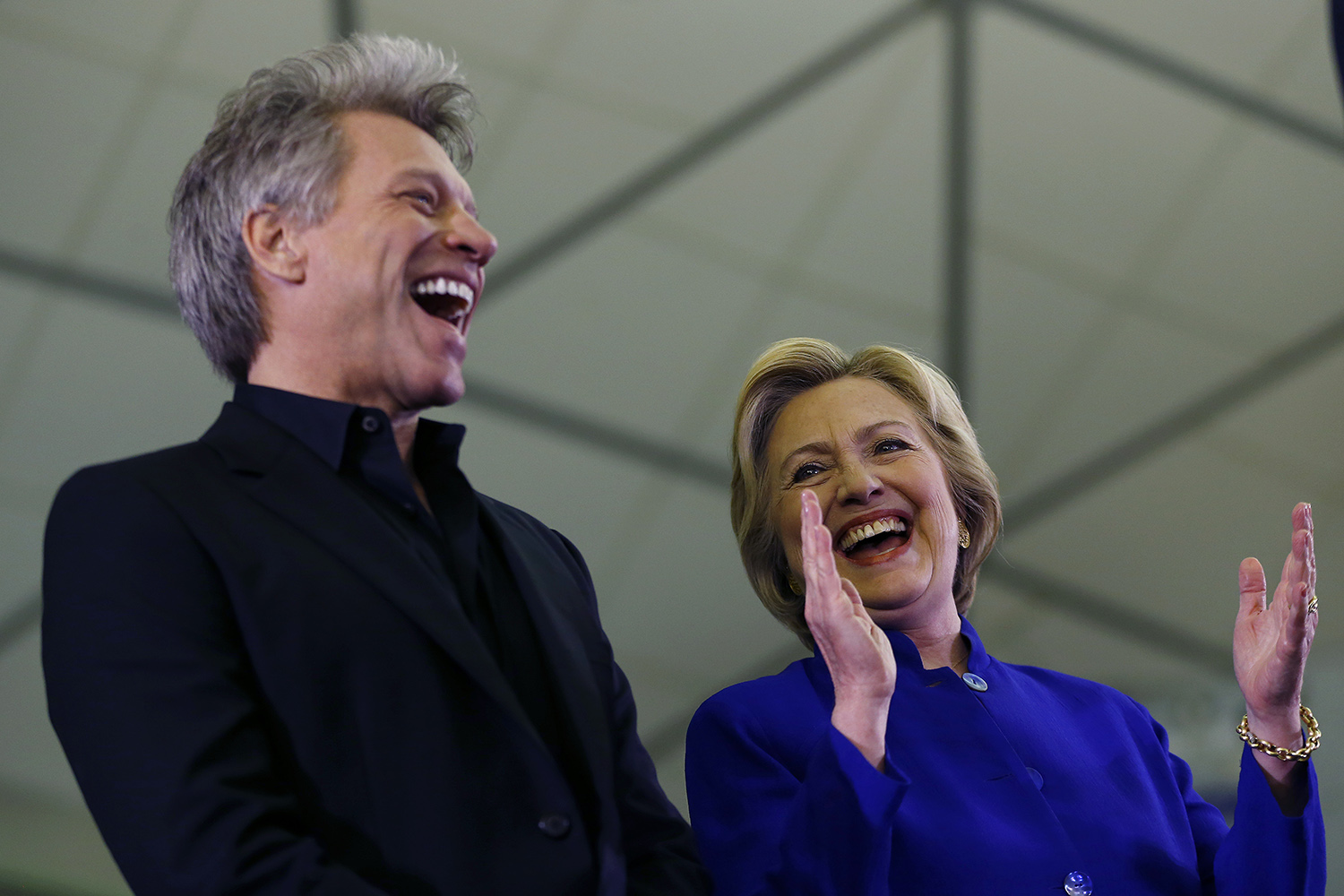 Booker quotes Bon Jovi to Clinton: ‘You give love a good name’