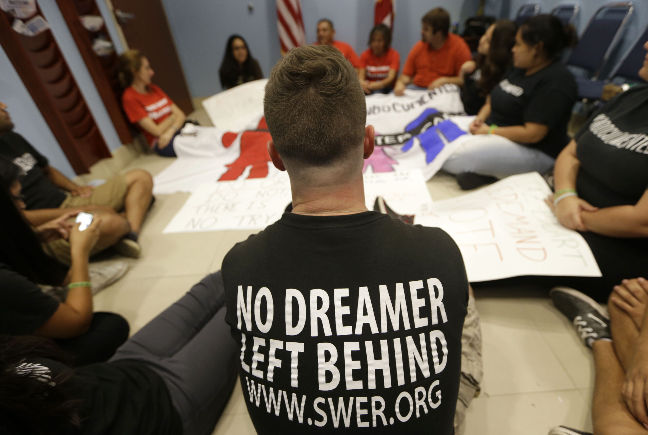 Immigrants sit in at Mario Diaz-Balart’s office