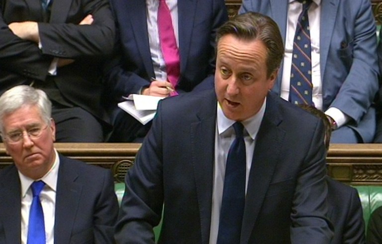Britain's Prime Minister David Cameron makes a statement in the House of Commons, London where he announced his government's Strategic Defence and Security Review Monday. (PA via AP)