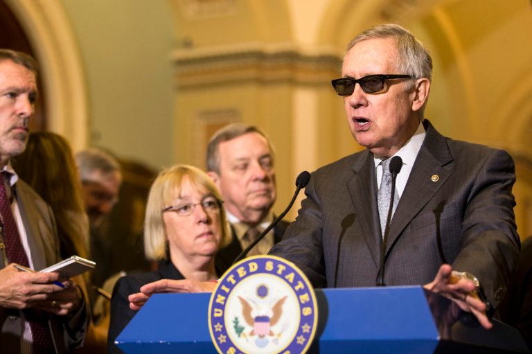 Senate Minority Leader Harry Reid of Nev., accompanied by Sen. Patty Murray, D-Wash., and Senate Minority Whip Richard Durbin of Ill., speaks to reporters on Capitol Hill in Washington, Tuesday, May 5, 2015, following a policy luncheon.  (AP Photo/Brett Carlsen)