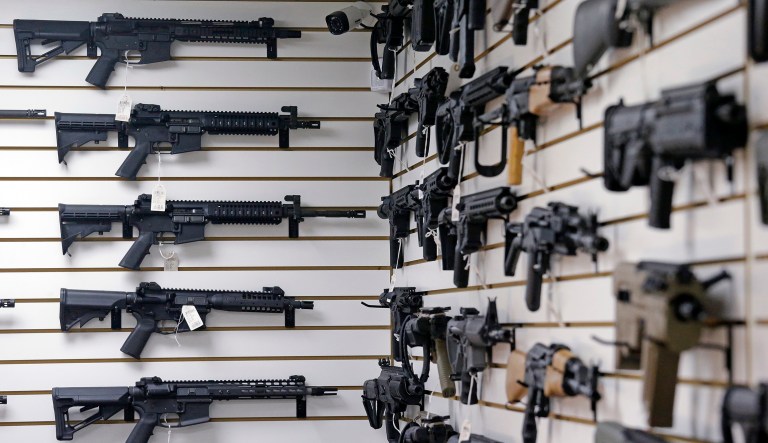 Under federal law, a firearm sale can proceed if a background check is not completed within 72 hours. (AP Photo/Elaine Thompson)