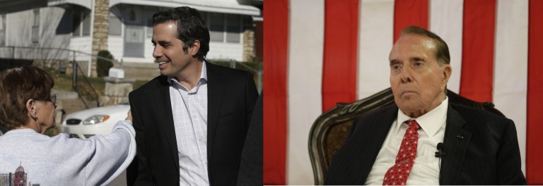 Independent senate candidate Greg Orman, left, talks with a supporter before a campaign event in Kansas City, Kan., Friday, Oct. 31, 2014. (AP Photo/Orlin Wagner)
Former Kansas Sen. Bob Dole speaks during a campaign stop for Republican Sen. Pat Roberts at a mall Monday, Sept. 22, 2014, in Dodge City, Kan. (AP Photo/Charlie Riedel)