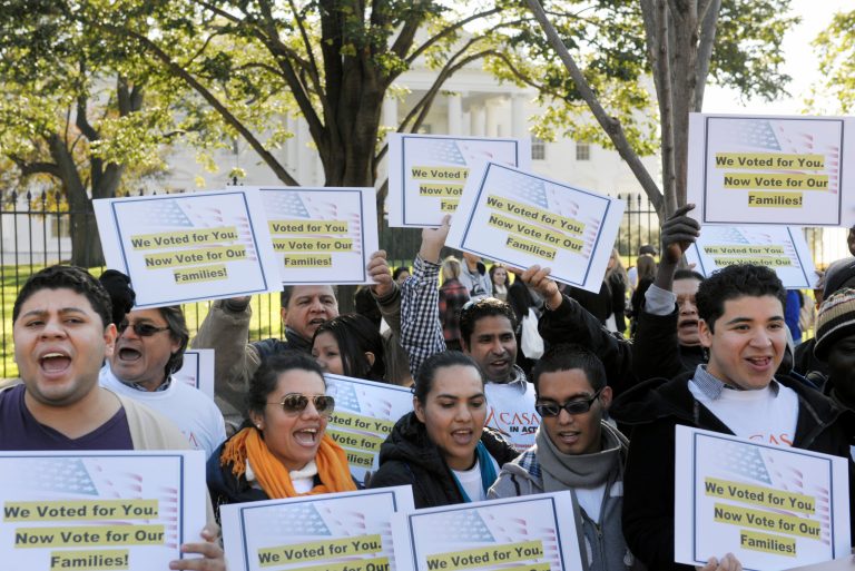 Members of immigration rights organizations, including Casa in Action and Maryland Dream Act, demonstrate in front of the White House as they call on President Obama to fulfill his promise of passing comprehensive immigration reform in November. Maryland passed the Dream Act in November, but proposed legislation would require state universities to report how many illegal immigrants attend each year. (AP Photo/Cliff Owen)