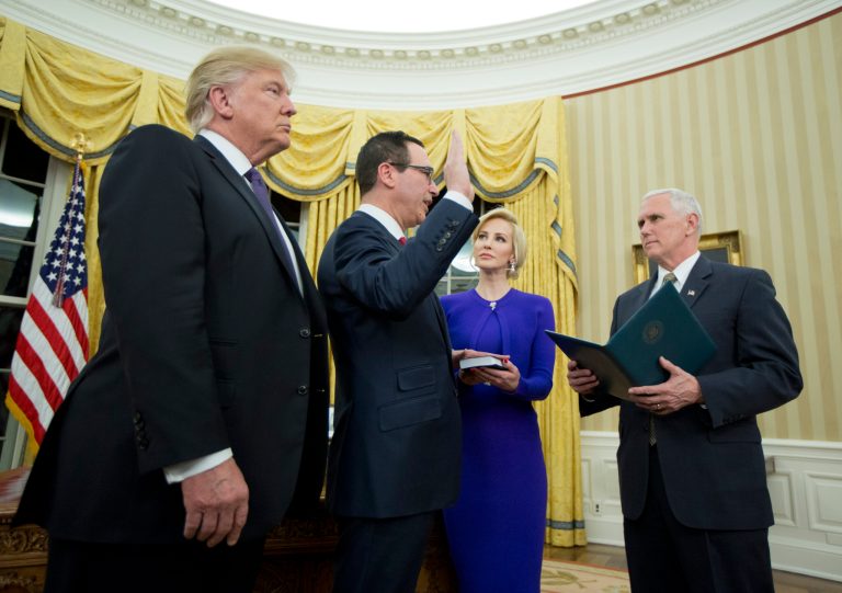 On being sworn in as the 77th secretary of the treasury Monday night, Steven Mnuchin invoked President Trump's catchphrase. (AP Photo/Manuel Balce Ceneta)