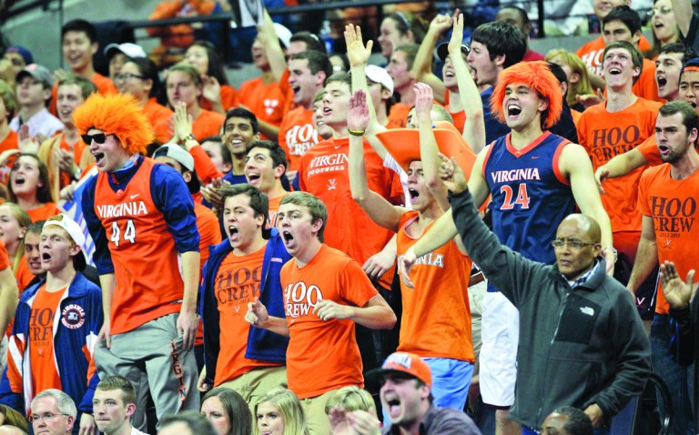 Steve Helber/AP
Virginia fans cheer on their team as the Cavaliers defeat N.C. State 58-55 in Charlottesville, Va., on Tuesday.