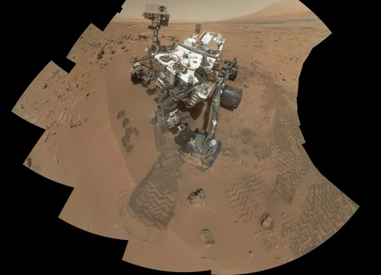   This image released by NASA shows the work site of the NASAâs rover Curiosity on Mars. Results are in from the first test of Martian soil by the rover Curiosity: So far, there is no definitive evidence that the red planet has the chemical ingredients to support life.Scientists said Monday, Dec. 3, 2012 that a scoop of sandy soil analyzed by the rover's chemistry lab contained water and a mix of chemicals, but not the complex carbon-based compounds considered necessary for microbial life. (AP Photo/NASA)  