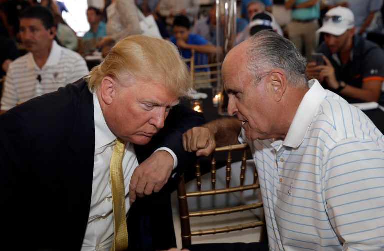 The GOP ticket? Republican presidential candidate Donald Trump, left, talks the former New York City mayor Rudy Giuliani at a fundraising event in the Bronx borough of New York, Monday, July 6, 2015. (AP Photo/Seth Wenig)