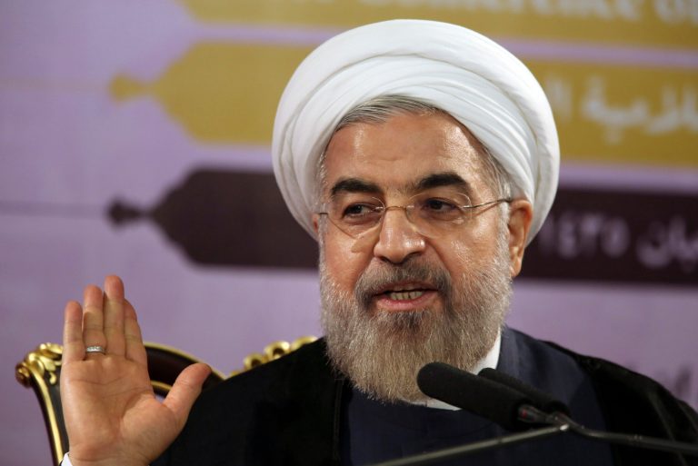 Iranian President Hassan Rouhani gestures as he speaks during a press conference in Tehran, Iran, Saturday, June 14, 2014. Rouhani says the international sanctions regime has crumbled and will not be rebuilt even if Iran and world powers fail to reach a final nuclear deal by a July 20 deadline. Iran and the five permanent members of the U.N. Security Council plus Germany reached an interim deal in November that limited Iran's uranium enrichment program in exchange for the easing of some sanctions. (AP Photo/Vahid Salemi)