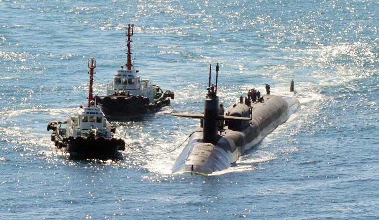 The nuclear-powered submarine USS Michigan approaches a naval base in Busan, South Korea, amid North Korea's nuclear and missile provocations Friday, Oct. 13, 2017. (Ha Kyung-min/Newsis via AP)