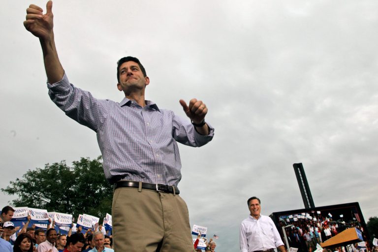 Republican presidential candidate, former Massachusetts Gov. Mitt Romney, right, and vice presidential running mate Rep. Paul Ryan R-Wis., appear on stage during a campaign event at the Waukesha County Expo Center, Sunday, Aug. 12, 2012, in Waukesha, Wis. (AP Photo/Mary Altaffer)
