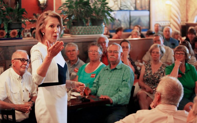 Carly Fiorina said her attacks on Democratic presidential nominee frontrunner Hillary Clinton have "nothing to do with the fact that either one of us are women." (AP Photo)