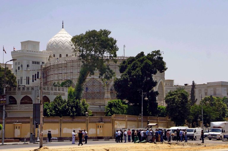 Egyptian security forces inspect the scene after two homemade bombs went off near the presidential palace in Cairo, Egypt, Monday, June 30, 2014. The bombs killed a senior police officer and wounded many people, security officials said. (AP Photo/Ahmed Abdel Fattah, El Shorouk Newspaper) EGYPT OUT