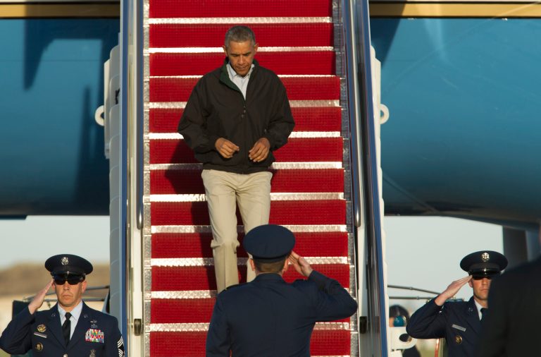 President Barack Obama walks down the stairs of Air Force One upon his arrival at Andrews Air Force Base, Sunday, March 29, 2015. (AP Photo/Jose Luis Magana)