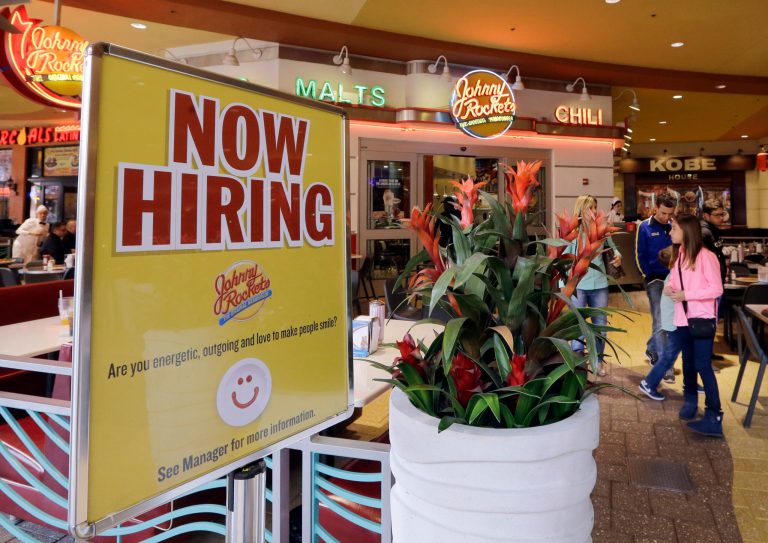 A Miami Johnny Rockets restaurant posts a sign indicating they are hiring. (AP Photo/Alan Diaz)