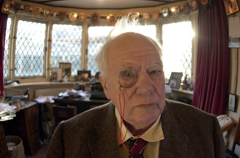   CORRECTS SPELLING OF SELSEY FILE - In this Dec. 29, 2000 file photo, British astronomer and broadcaster Patrick Moore at his home in Selsey, West Sussex, England. British astronomer and broadcaster Sir Patrick Moore has died, aged 89, his friends and colleagues have said, on Sunday, Dec. 9, 2012. (AP Photo/ Kirsty Wigglesworth/PA File) UNITED KINGDOM OUT   