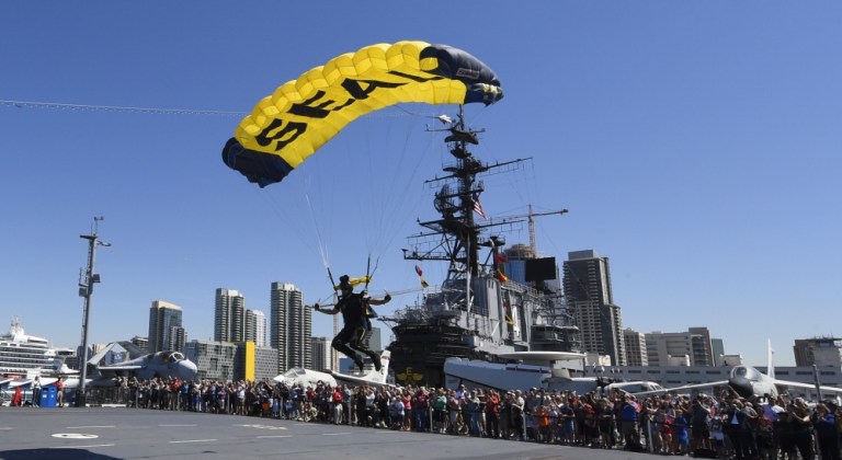 Retired U.S. Navy SEAL Jim Woods, a member of the U.S. Navy Parachute Team, the Leap Frogs, comes in for a landing during a skydiving demonstration above the USS Midway Museum in San Diego March 29, 2017. The Leap Frogs are based in San Diego and perform aerial parachute demonstrations around the nation in support of Naval Special Warfare and Navy recruiting. (U.S. Navy photo)