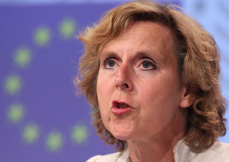 Connie Hedegaard, the EU's climate chief, said she wasn't ready to settle for a mix of voluntary environmental pledges and some legally binding provisions like the ones the White House is reportedly coveting. (AP Photo/Yves Logghe)