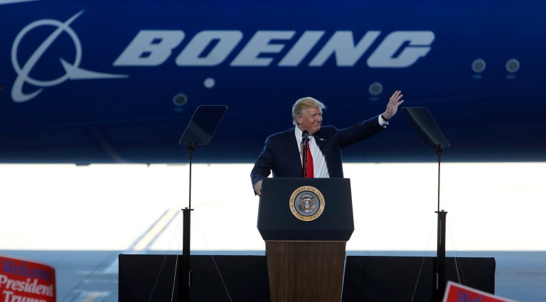 President Trump personally visited Boeing — a major manufacturing exporter — to celebrate the unveiling of its impressive new Dreamliner. (AP Photo/Mic Smith)