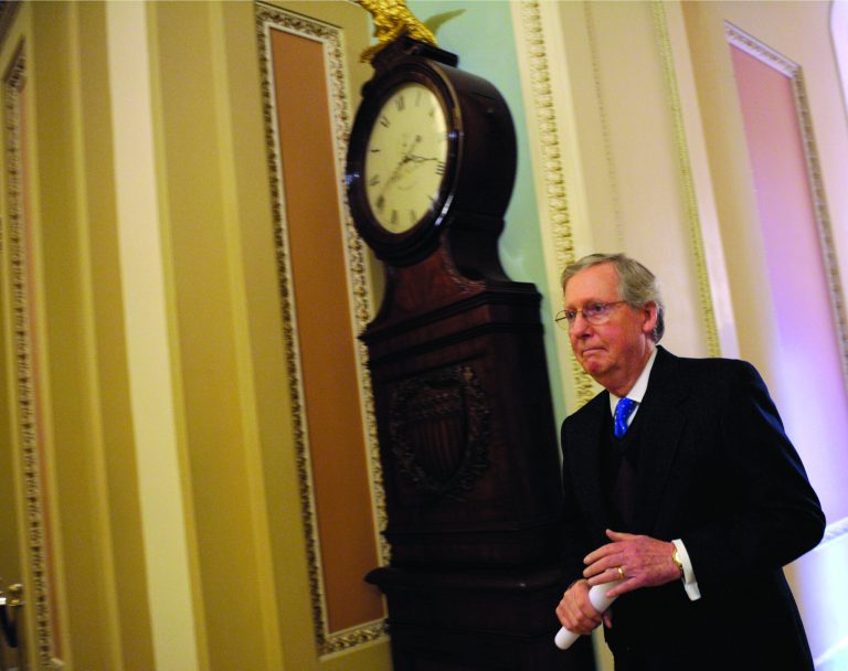Senate Minority Leader Mitch McConnell of Ky. walks to the Senate floor on Capitol Hill in Washington, Thursday, Dec. 27, 2012. (AP Photo/Susan Walsh)