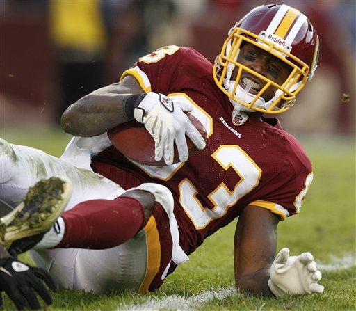 Washington Redskins tight end Fred Davis looks up after a hit during the second half of an NFL football game against the New York Jets in Landover, Md., Sunday, Dec. 4, 2011.