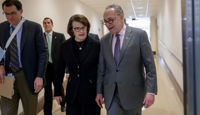 After the government shutdown ended, Senate Minority Leader Chuck Schumer, D-N.Y., (pictured right) and Sen. Dianne Feinstein, D-Calif., both signaled that they were against President Trump's new immigration plan on their internet pages. (AP Photo/J. Scott Applewhite)