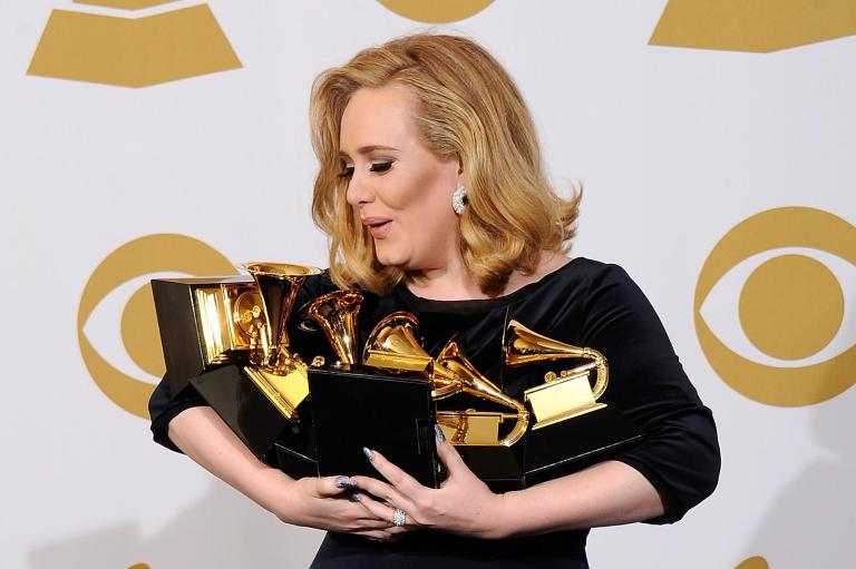 Adele rides Grammy wins on album charts