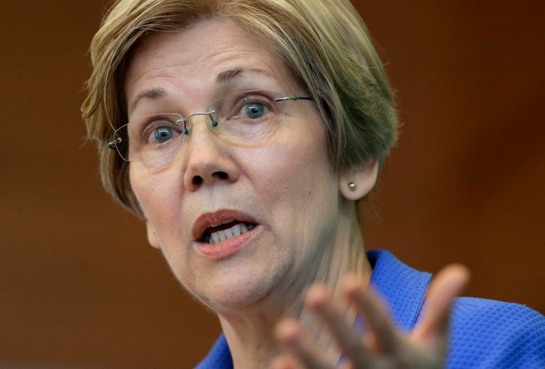 Warren and 10 others announced that they would introduce the Tax Filing Simplification Act of 2017, which would allow the IRS to provide free online filing software. (AP Photo/Steven Senne)