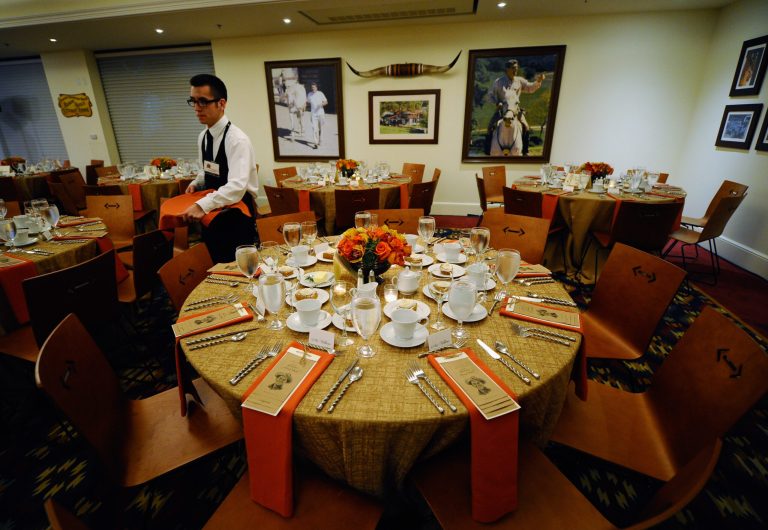 A waiter walks among the tables at the Reagan Ranch Center on February 4, 2011 in Santa Barbara, California. (Photo by Kevork Djansezian/Getty Images)