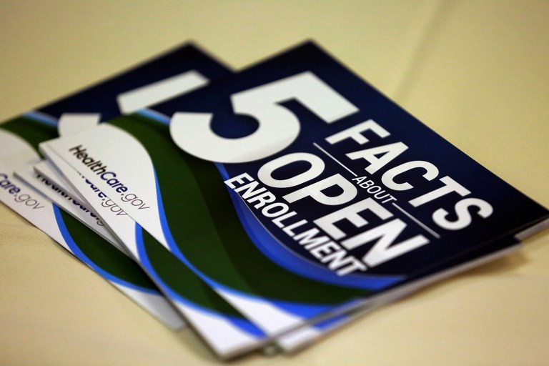 Enrollment will range between 10.2 and 11.6 million people, about the same as this year, the report shows. (AP Photo/Eric Gay)