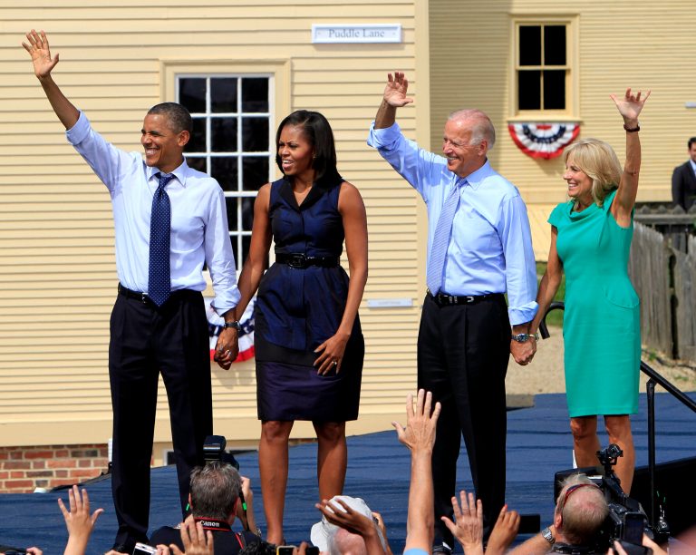 The White House released two Christmas-themed playlists on Spotify Wednesday compiled by the Obamas and the Bidens. (AP Photo/Jim Cole)