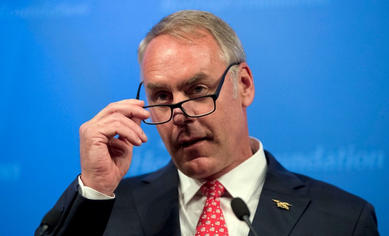 Interior Secretary Ryan Zinke is under investigation by the department's inspector general and the Office of Special Counsel for mixing business and political travel. (AP Photo/Andrew Harnik)