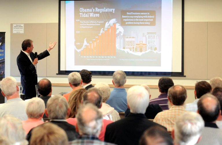 Rep. Jim Renacci, R-Ohio, speaks at a town hall meeting Aug. 15 at Schmid Hall in Orrville, Ohio. (AP/Tom E. Puskar)