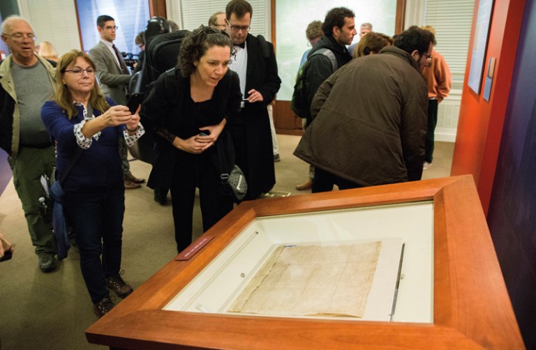 Visitors tour the Library of Congress new exhibit, Magna Carta: Muse and Mentor, Thursday, Nov. 6, 2014, in Washington. (AP Photo/Evan Vucci)