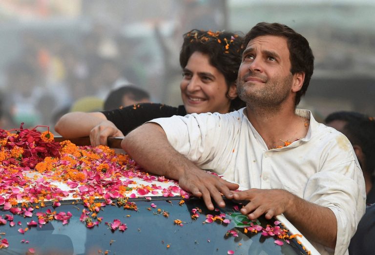 HOLD TO GO WITH STORY 'INDIA CONGRESS FAMILY POLITICS' BY NIRMALA GEORGE- In this Sunday, May 4, 2014 photo, Indiaâs Congress party Vice President Rahul Gandhi, front, and his sister Priyanka Vadra campaign in Gandhiâs home constituency of Amethi, in the northern Indian state of Uttar Pradesh. The charisma of four generations of the Nehru-Gandhi dynasty that has steered the 128-year old Congress party has lost its shine, and the party appeared headed for its most crushing defeat ever when results from India's general elections are declared on May 16. During his campaign, Gandhi has tried to whip up some fire into his speeches, but the crowds are far from impressed. What has caught their attention and is drawing them to election rallies is the presence of Vadra who addresses party workers and public rallies with ease and a comfort-level that many have compared to that of her grandmother, Indira Gandhi. (AP Photo)