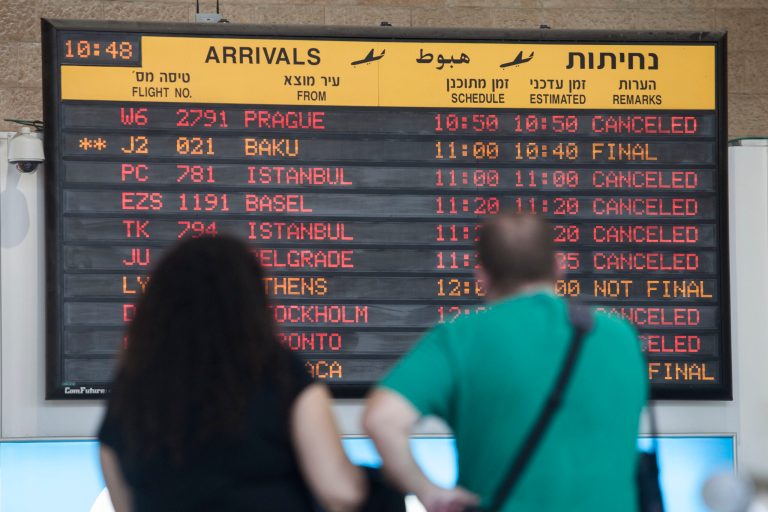 A arrivals flight board displays various canceled and delayed flights in Ben Gurion International airport a day after the U.S. Federal Aviation Administration imposed a 24-hour restriction on flights after a Hamas rocket landed Tuesday within a mile of the airport, in Tel Aviv, Israel, Wednesday, July 23, 2014. U.S. Secretary of State John Kerry flew into Israel's main airport Wednesday despite a Federal Aviation Administration ban in an apparent sign of his determination to achieve a cease-fire agreement in the warring Gaza Strip despite little evidence of progress in ongoing negotiations. (AP Photo/Dan Balilty)