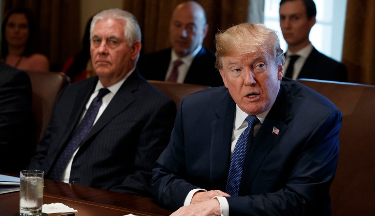 According to a report, President Trump (pictured left) complained during an Oval Office meeting in June about immigrants, going so far as to say Haitians 