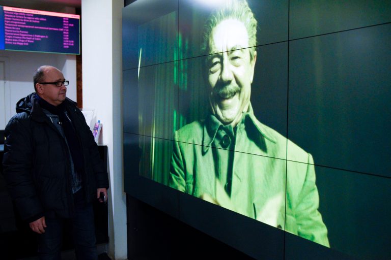 A screen in Pioner movie theater shows an episode with actor Adrian McLoughlin as Soviet leader Josef Stalin, from the Death of Stalin film, in Moscow, Russia, Thursday, Jan. 25, 2018. A Moscow movie theater has shown a satirical film about Soviet leader Josef Stalin despite an official ban. (AP Photo/Alexander Zemlianichenko)