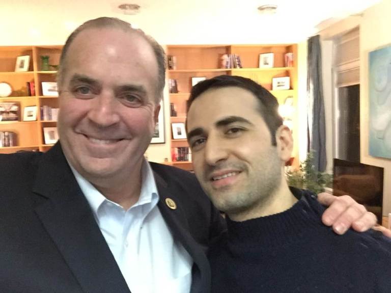 In a Monday, Jan. 18, 2016 photo provided by the Hekmati family, Rep. Dan Kildee, D-Flint Township, Mich., meets with former Iran prisoner Amir Hekmati at Landstuhl Regional Medical Center in Landstuhl, Germany. (Courtesy of the Hekmati Family via AP)