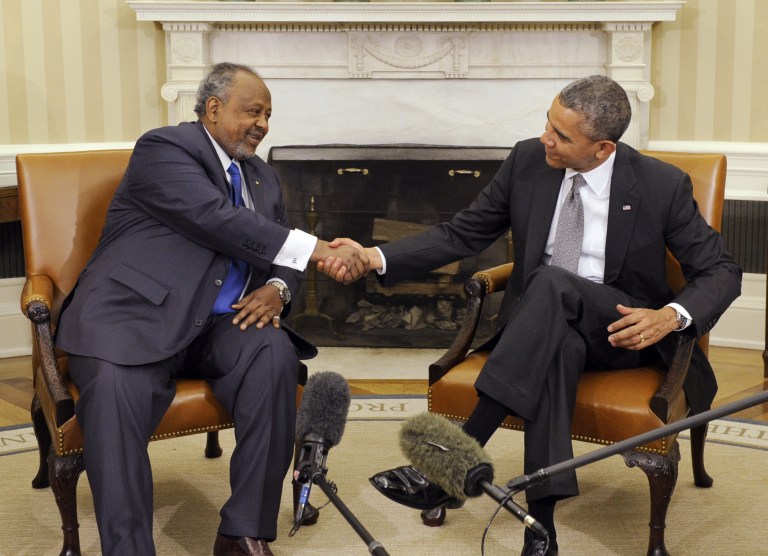 President Barack Obama, right, shakes hands with President Ismail Omar Guelleh of Djibouti, left, during a press availability before their bilateral meeting in the Oval Office of the White House in Washington, Monday, May 5, 2014. (AP Photo/Susan Walsh)