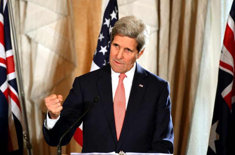 US Secretary of State John Kerry hold up his fist as he speaks to the media during a press conference at the conclusion of the AUSMIN talks at Admiralty House in Sydney, Tuesday, Aug. 12, 2014. US Secretary of State John Kerry and Defence Secretary Chuck Hagel are meeting with their Australian counterparts at the annual Australia-US Ministerial Consultations (AUSMIN), which will focus on regional security and enhanced military co-operation. (AAP Image/Dan Himbrechts/Pool)