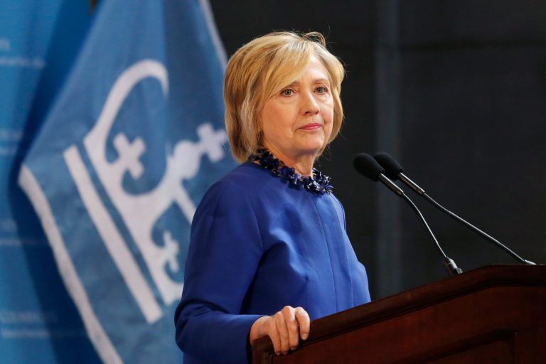 Hillary Clinton asks the audience to join her in praying for the people of Baltimore during a speech at the David N. Dinkins Leadership and Public Policy Forum, Wednesday, April 29, 2015 in New York. (AP Photo)