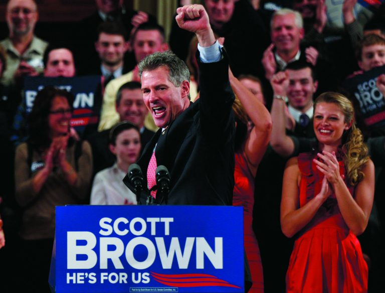 FILE - In this Jan. 19, 2012, file photo, then-Sen. Scott Brown, R-Mass., pumps his fist during his re-election campaign kick-off in Worcester, Mass., in this Jan. 19, 2012 file photo. Three years ago, Brown was a little-known Republican state senator from Massachusetts who shocked Democrats by winning a U.S. Senate seat. Now, having compiled a voting record more moderate than his tea party allies would have liked and losing his bid for a full term, Brown is considering whether to seize a second chance to return to the Senate in another special election. (AP Photo/Charles Krupa, File)