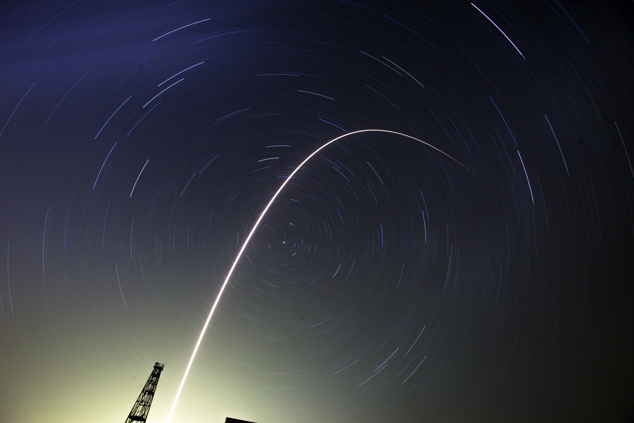 Spaceship with 3-man crew docks at space station