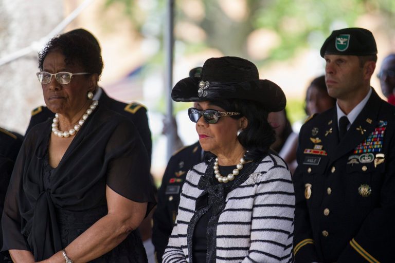 U.S. Rep. Frederica Wilson, D-Miami Gardens, center, attends the burial service of Sgt. La David Johnson at Fred Hunter's Hollywood Memorial Gardens in Hollywood, Fla., on Saturday, Oct. 21, 2017. Mourners remembered not only a U.S. soldier whose combat death in Africa led to a political fight between President Donald Trump and the Florida congresswoman but his three comrades who died with him. (Matias J. Ocner/Miami Herald via AP)